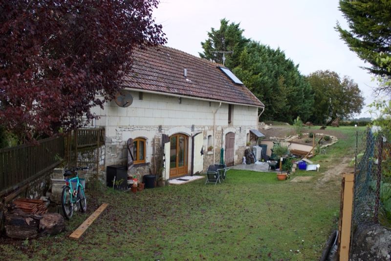 Rural stone house with garden yard