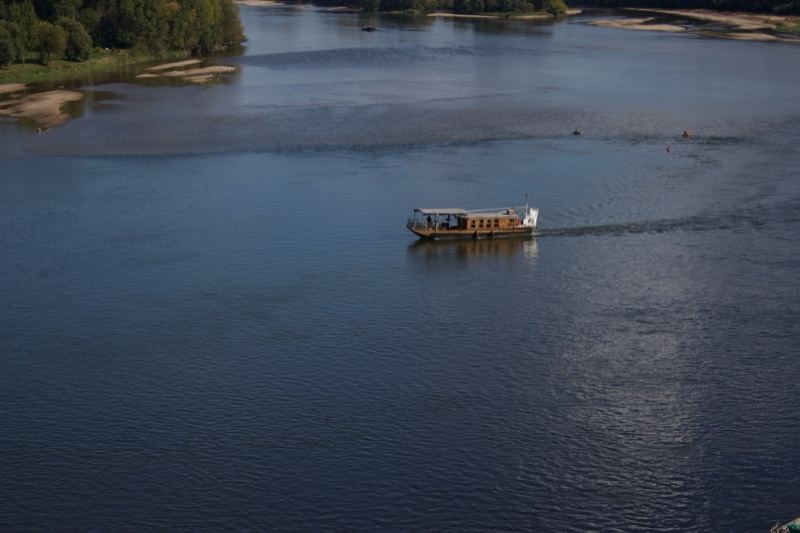 Boat on Wide River Aerial View