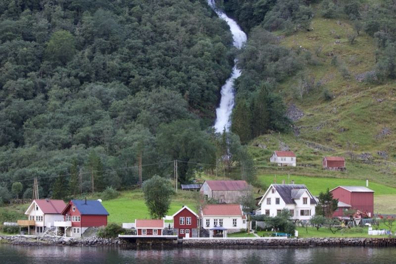 Norwegian Fjord Village With Waterfall