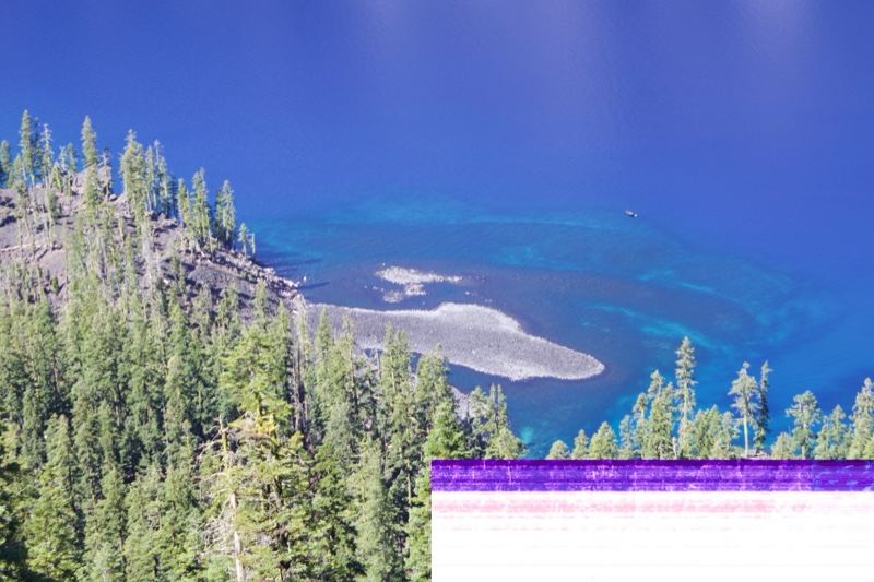 Deep Blue Lake with Forested Shore