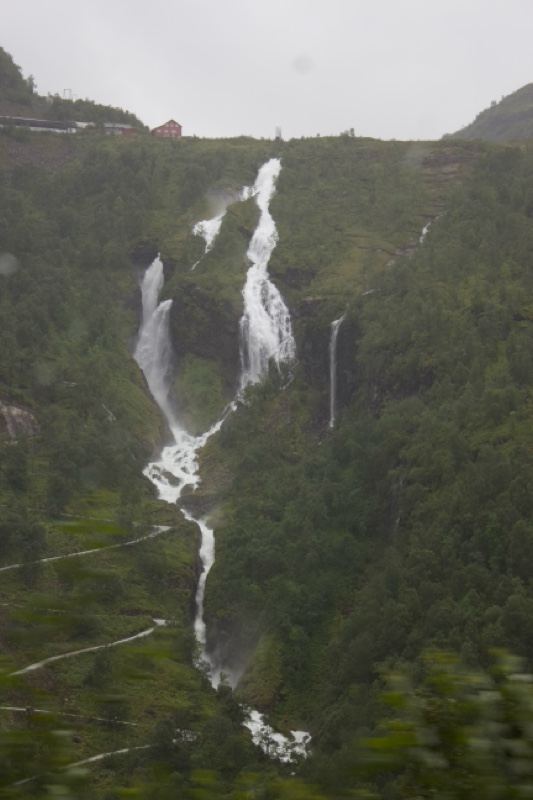 Mountain Waterfall Cascading Down Cliff