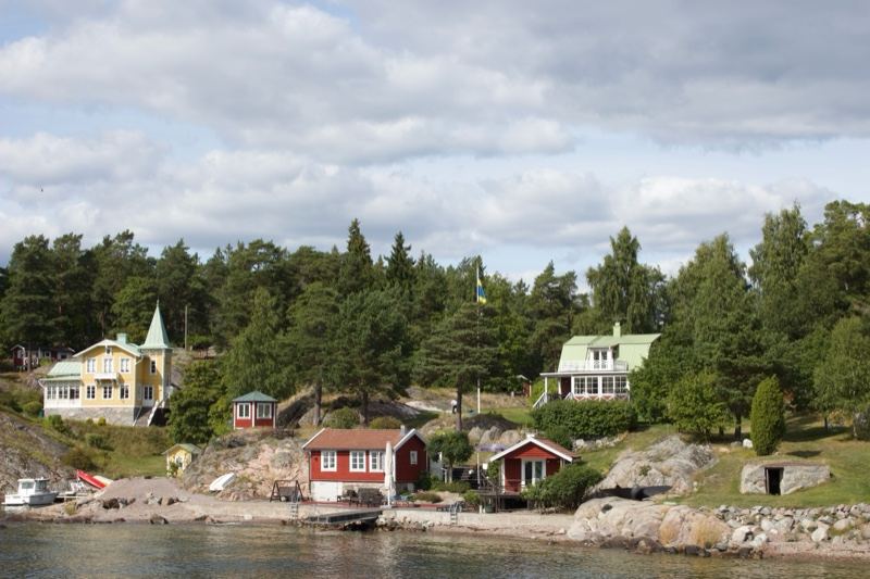 Coastal cabins on rocky shoreline