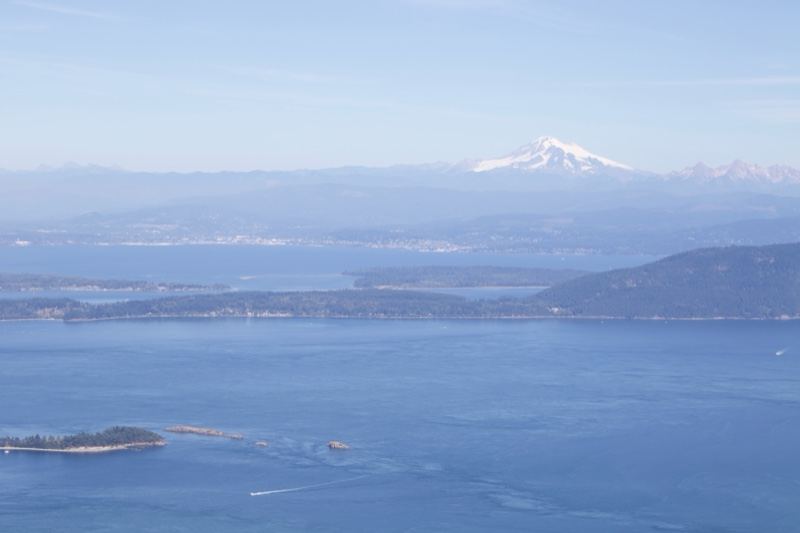 Snow-Capped Mountain Over Coastal Water