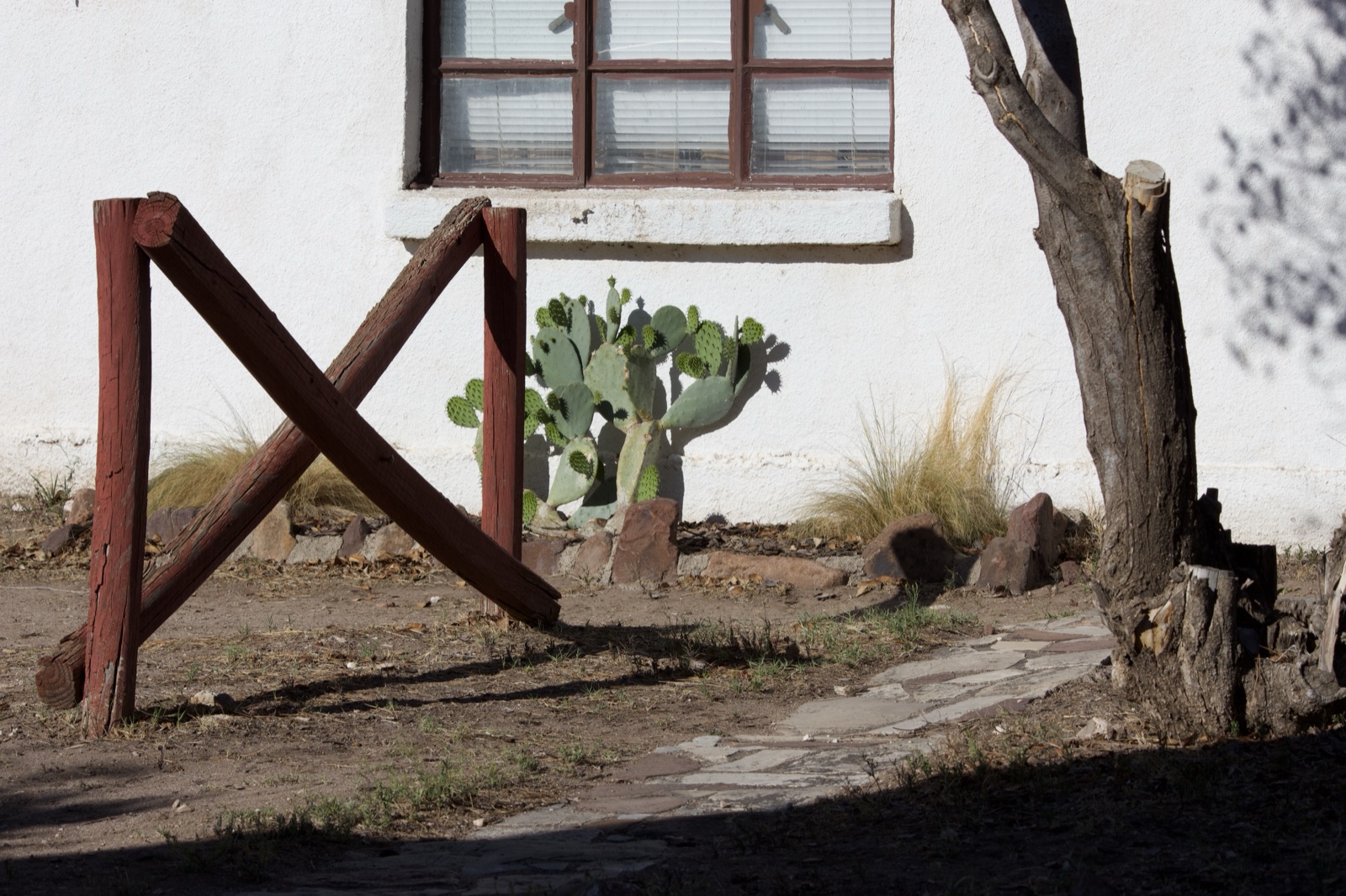 Wooden X Fence Beside White Building