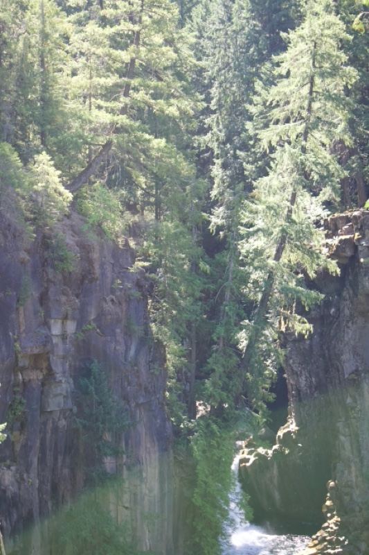 Sunlit Gorge With Reflecting River