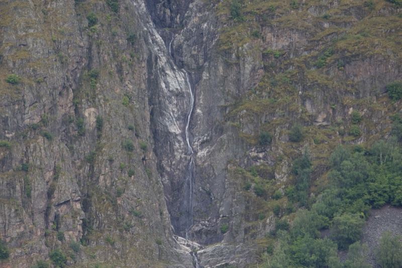 Mountain Waterfall Cascading Down Cliff