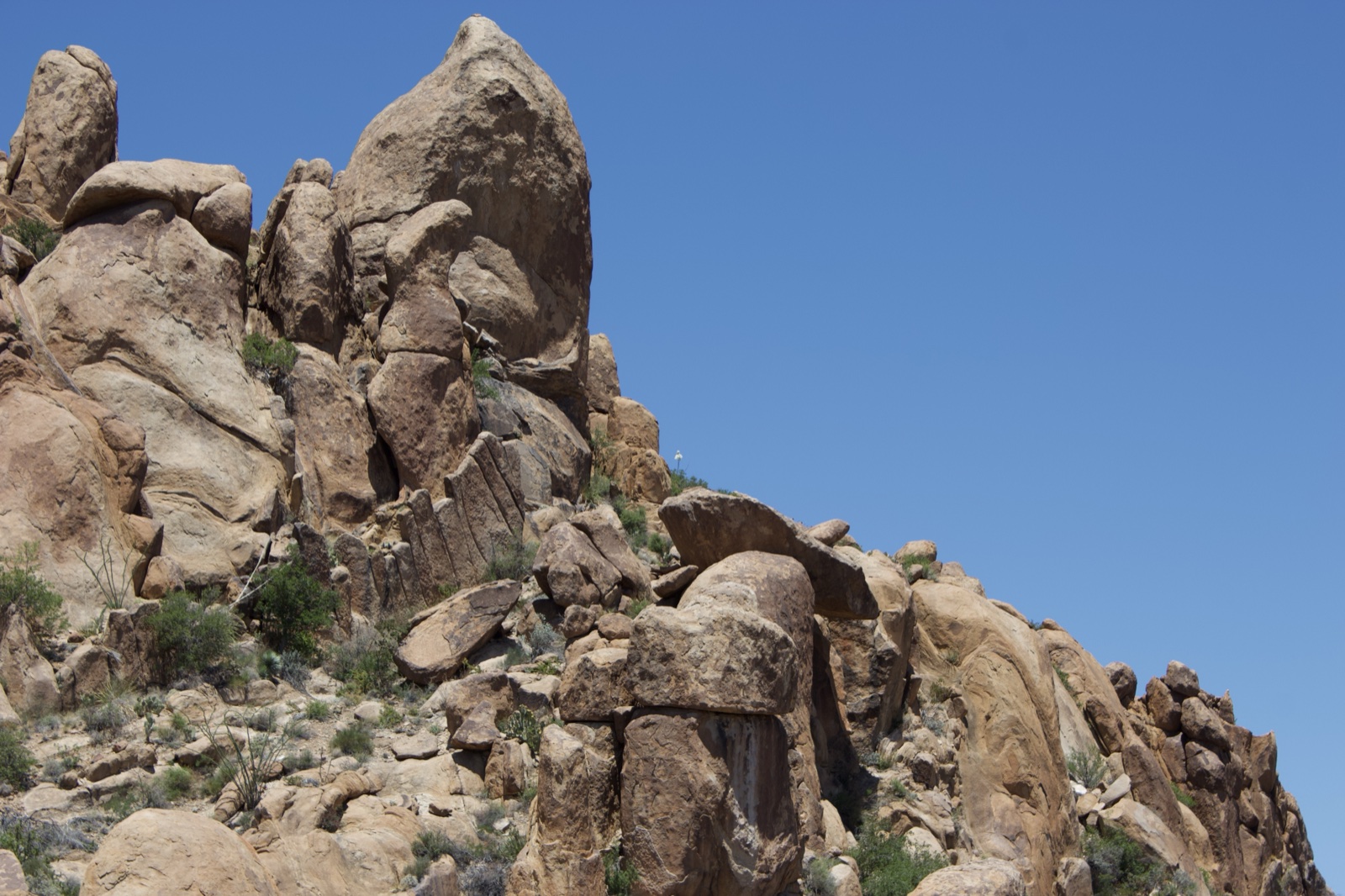 Rugged Desert Rock Formation Under Clear Sky