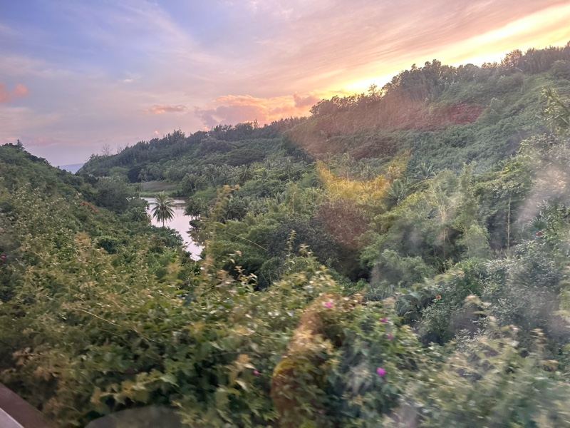 River Valley at Sunset Through Window