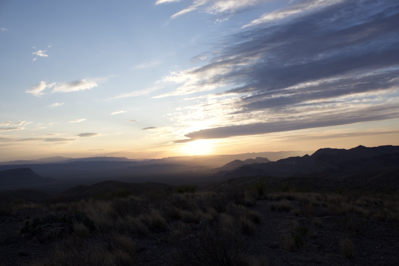 Desert Sunset Over Mountain Range