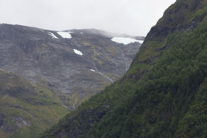 Mountain Valley With Snow Patches