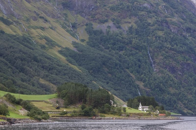 Fjord Valley Church Under Mountains