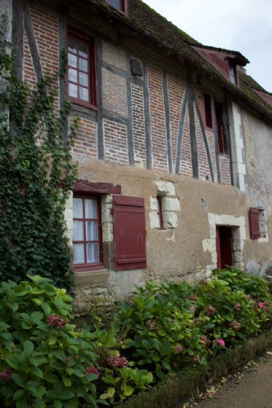 Half-timbered house with garden flowers