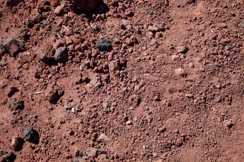 Reddish Volcanic Soil Texture Close-up