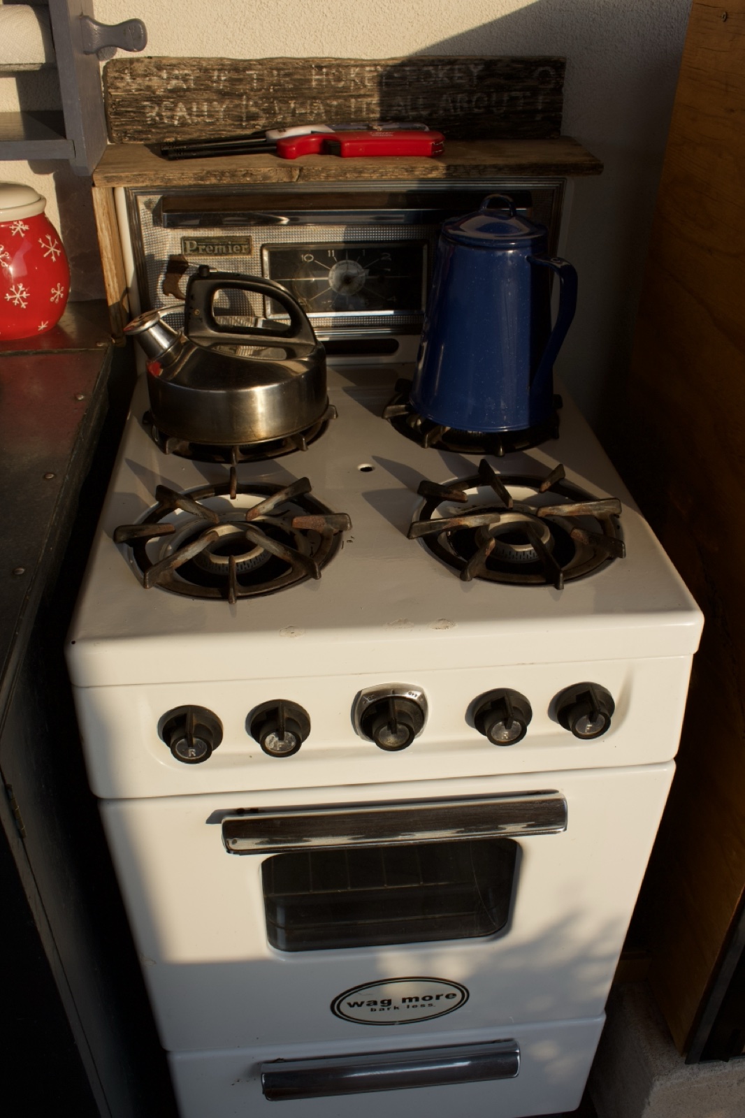 White gas stove with kettles
