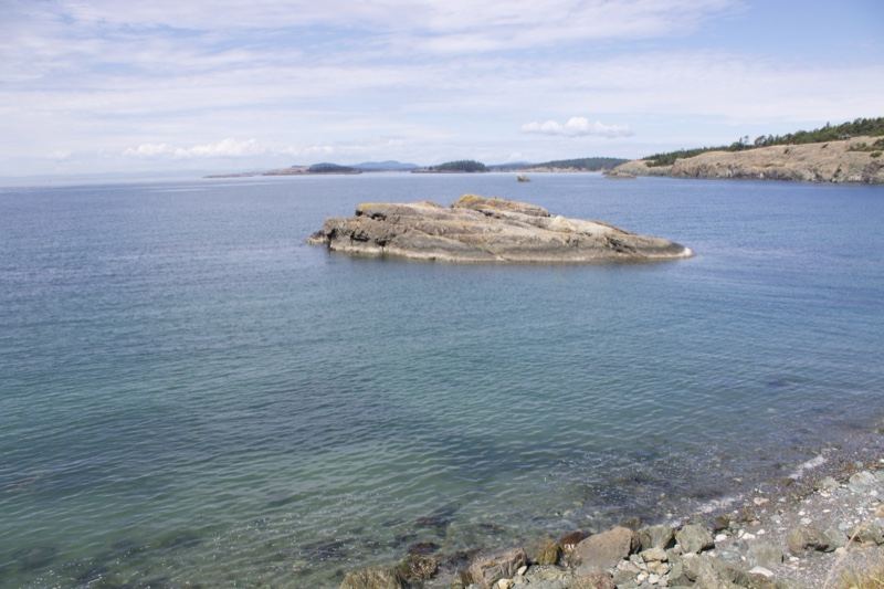 Rocky Islet in Calm Coastal Waters
