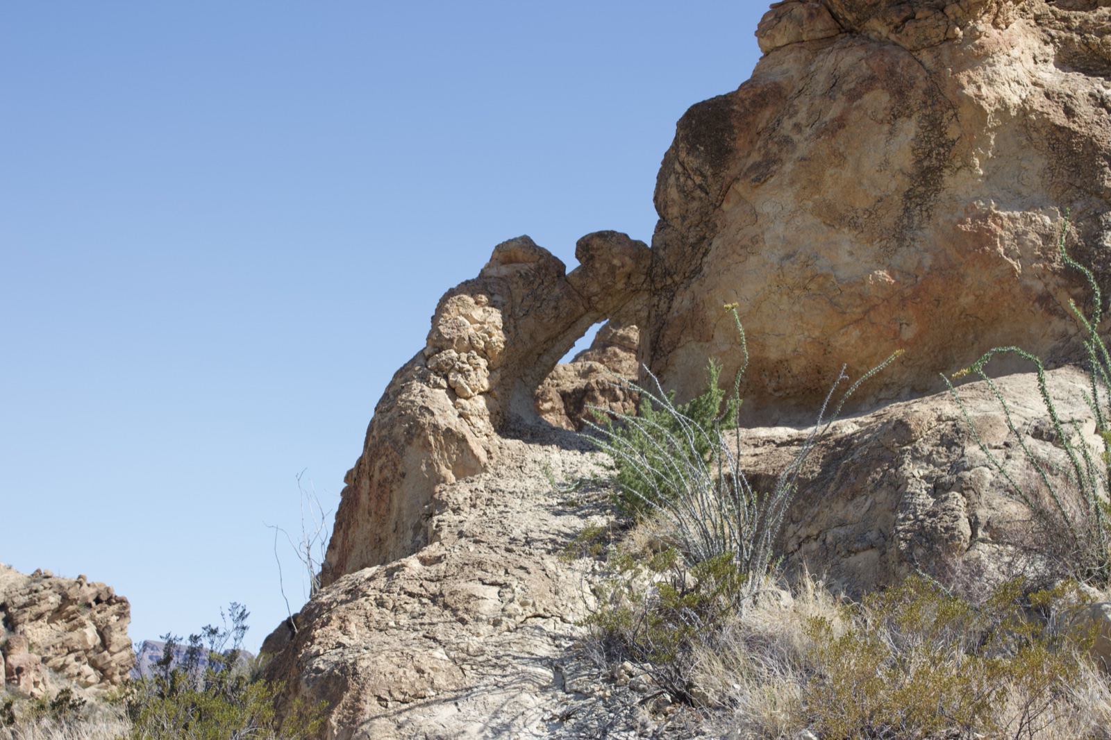 Natural rock arch in desert