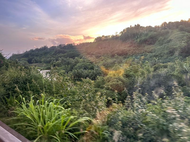 Sunset Over Lush Green Hills