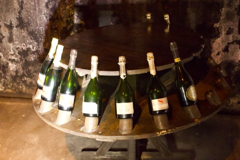 Champagne Bottles on Rotating Rack