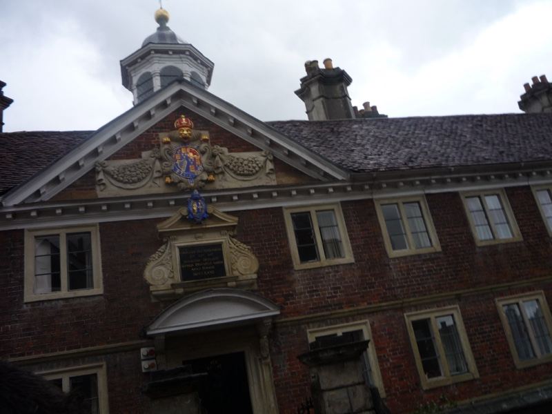 Historic brick manor with coat of arms