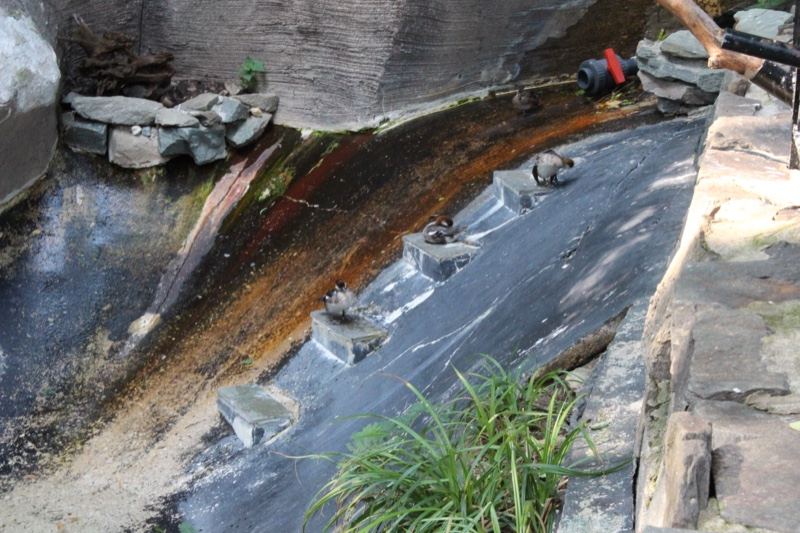 Artificial stream channel with plastic lining