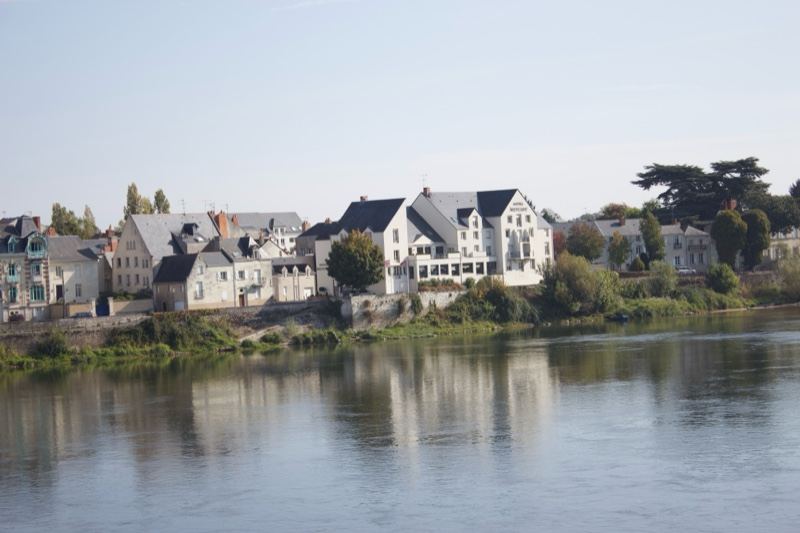 Riverside Houses Reflected in Water