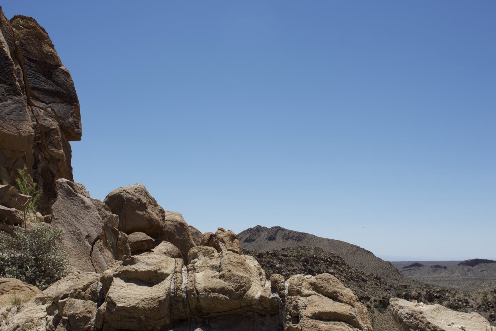 Desert Rocky Outcrop Under Clear Sky