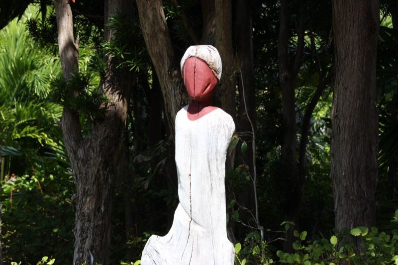 White Robed Statue in Forest