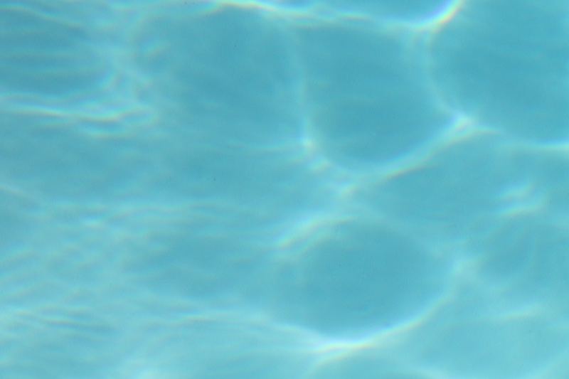 Turquoise Pool Water Surface Ripples
