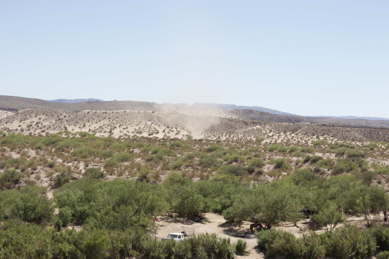 Desert Dust Devil Over Arid Landscape
