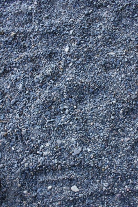 Dark gravel texture close-up
