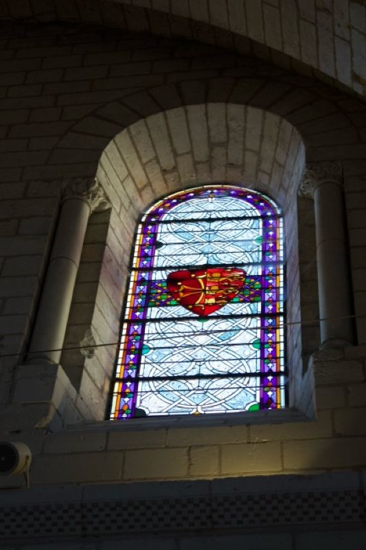 Stained Glass Heraldic Window in Stone Arch