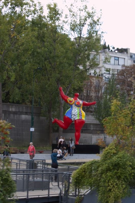 Colorful Red Sculpture in Urban Park
