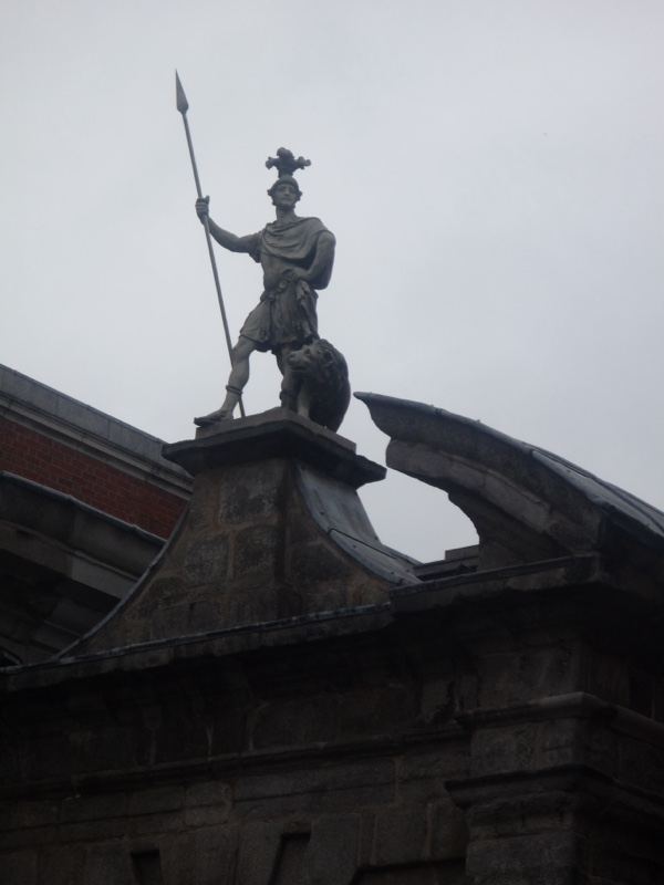 Statue on Rooftop Pediment