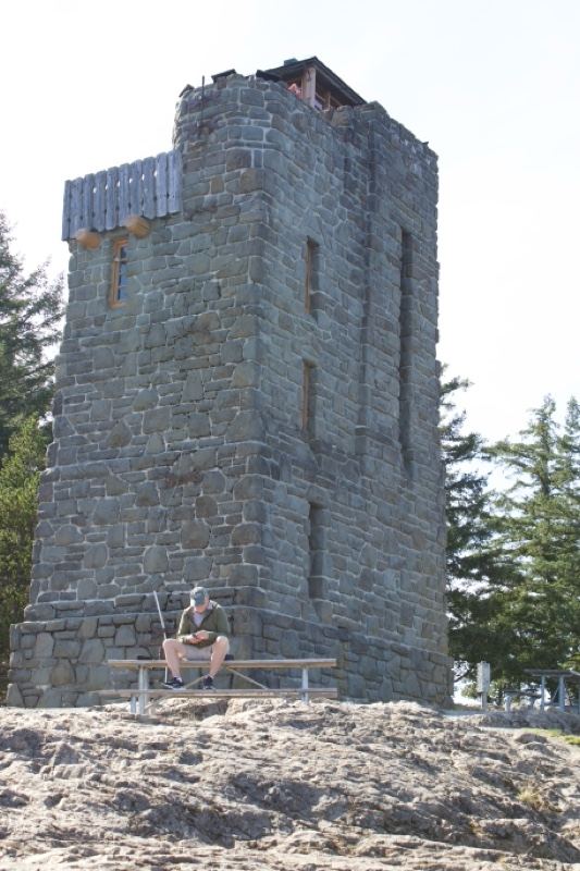 Stone Observation Tower with Visitor