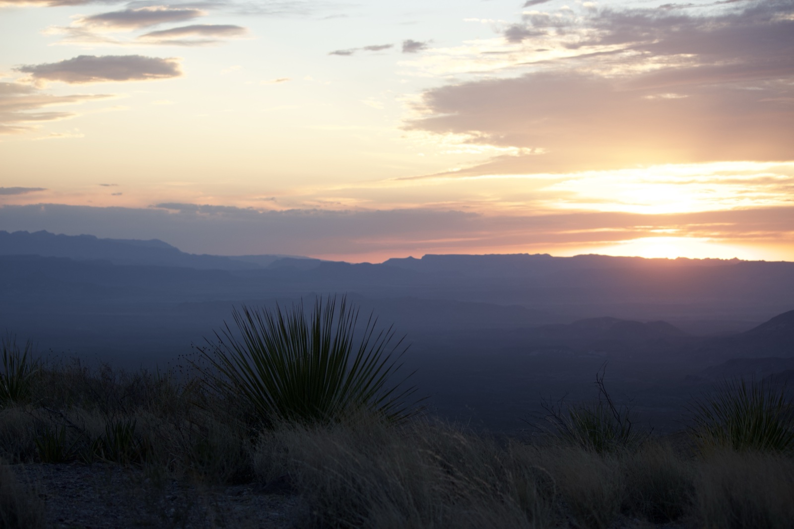 Desert Sunset Over Mountain Range