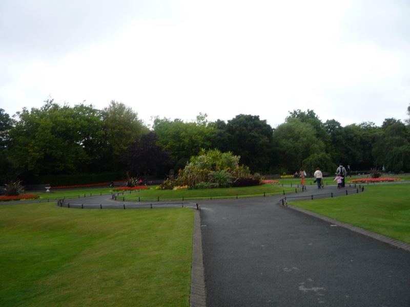 Park Pathway Under Overcast Sky