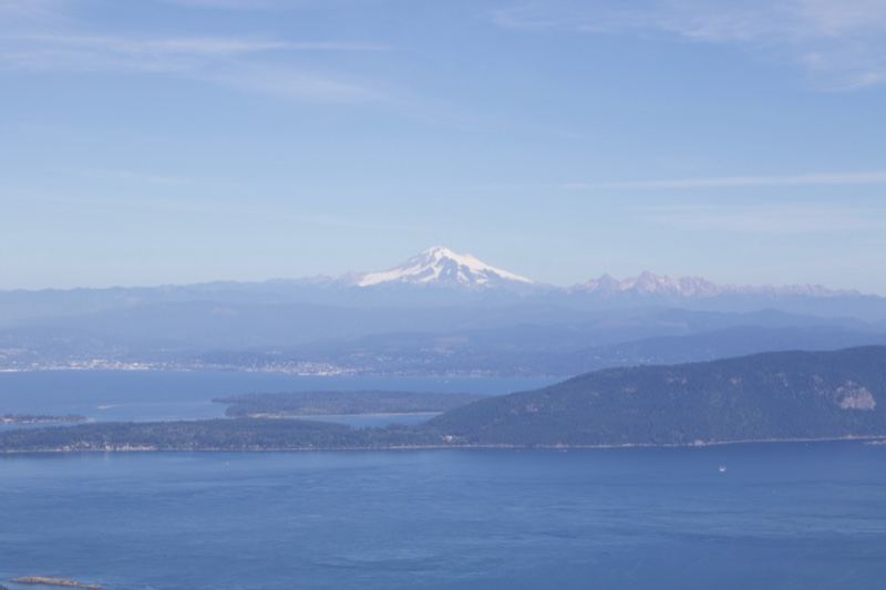 Snow-capped Mount Baker over coastal waters