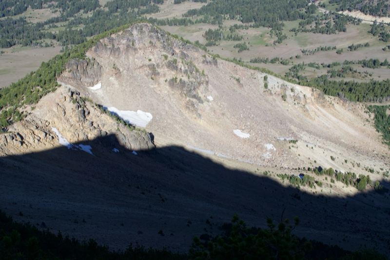 Sunlit Mountain Peak with Shadow