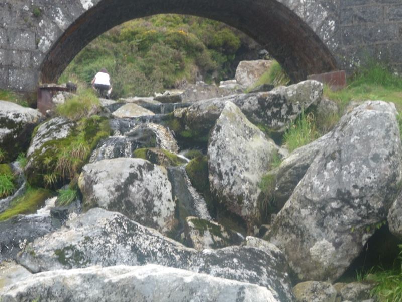 Stone Bridge Over Rocky Stream