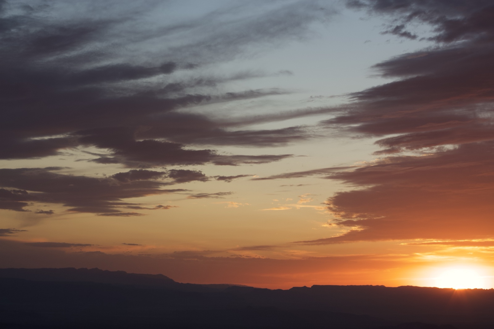 Sunset Over Mountain Range