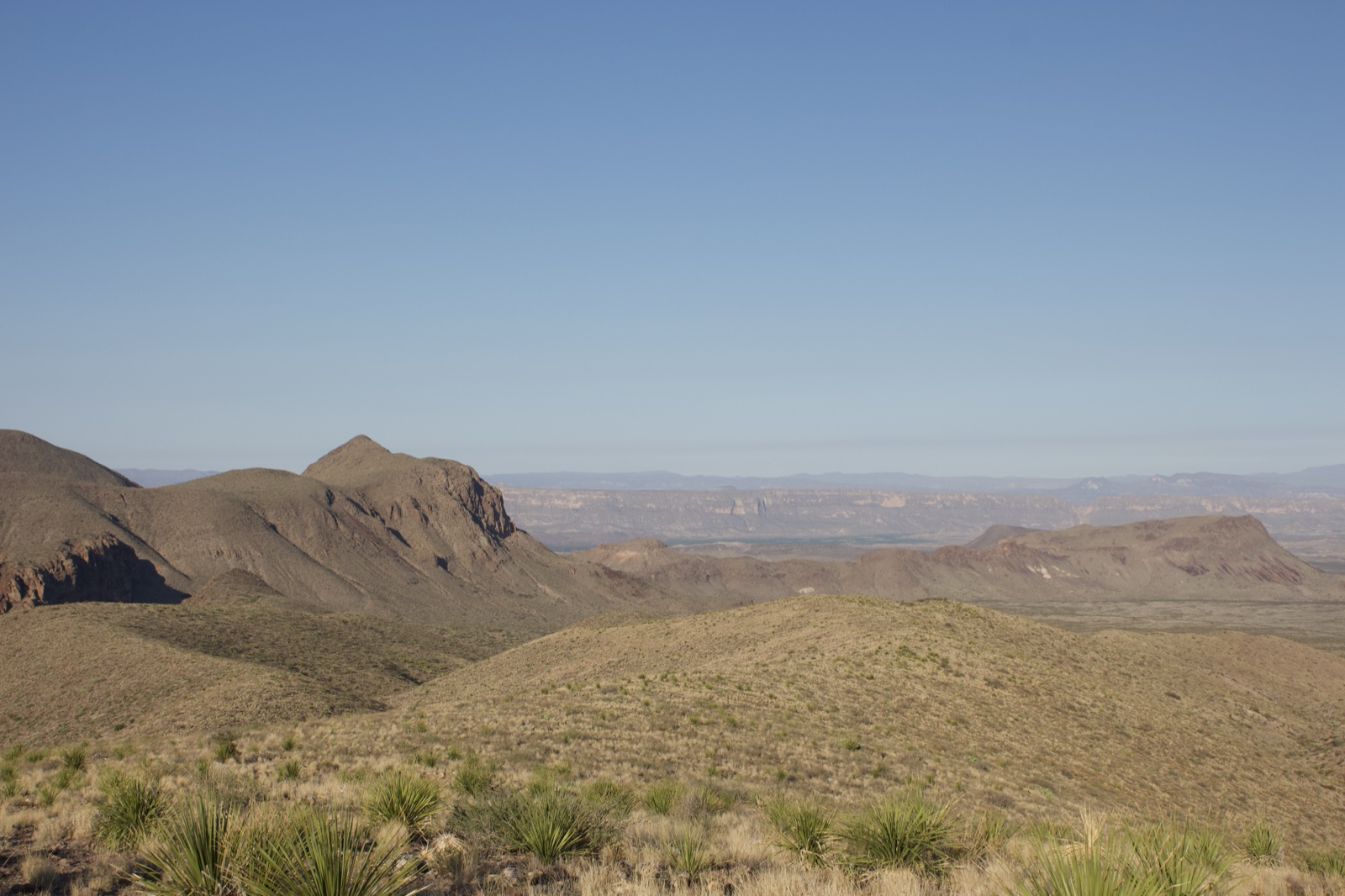 Arid Desert Hills Under Clear Sky