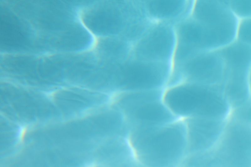 Sunlit Pool Water Ripples
