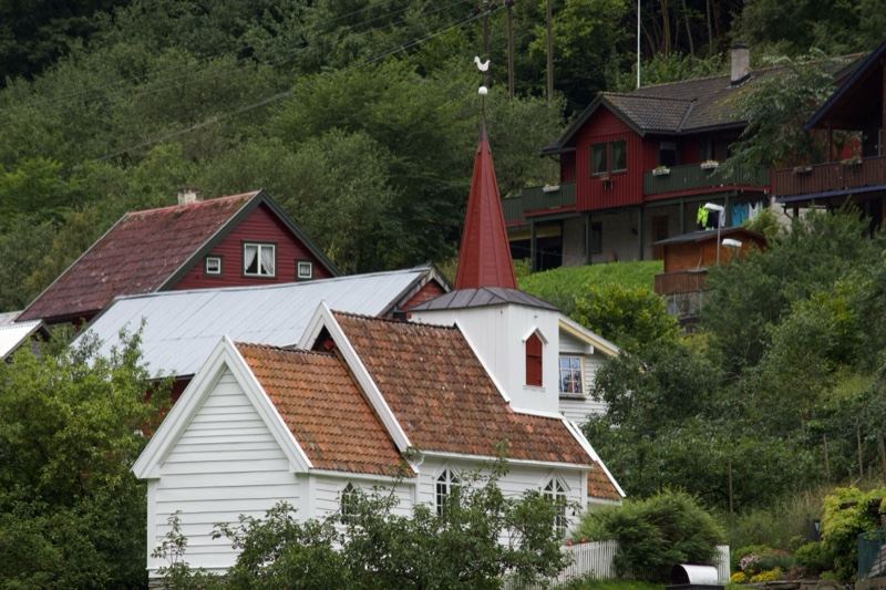 Norwegian Village Houses With Red Steeple