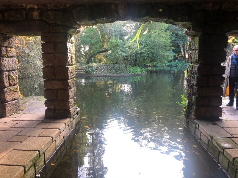 Stone Arch Over Pond in Park