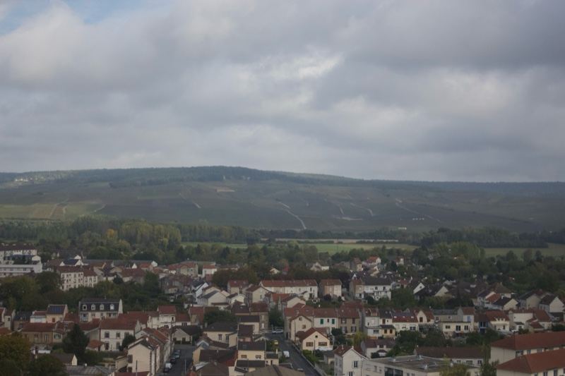 Overlook of Town Under Cloudy Sky