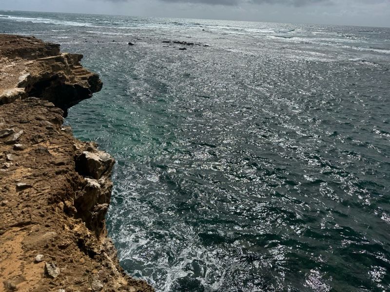 Rugged Cliff Over Choppy Ocean