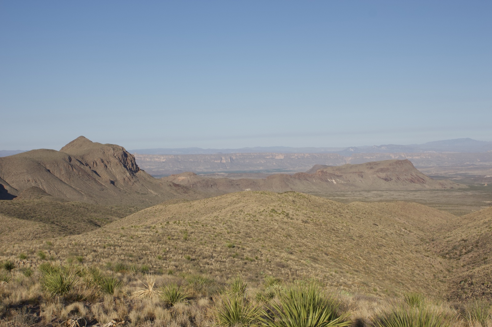 Desert mountain vista under clear sky