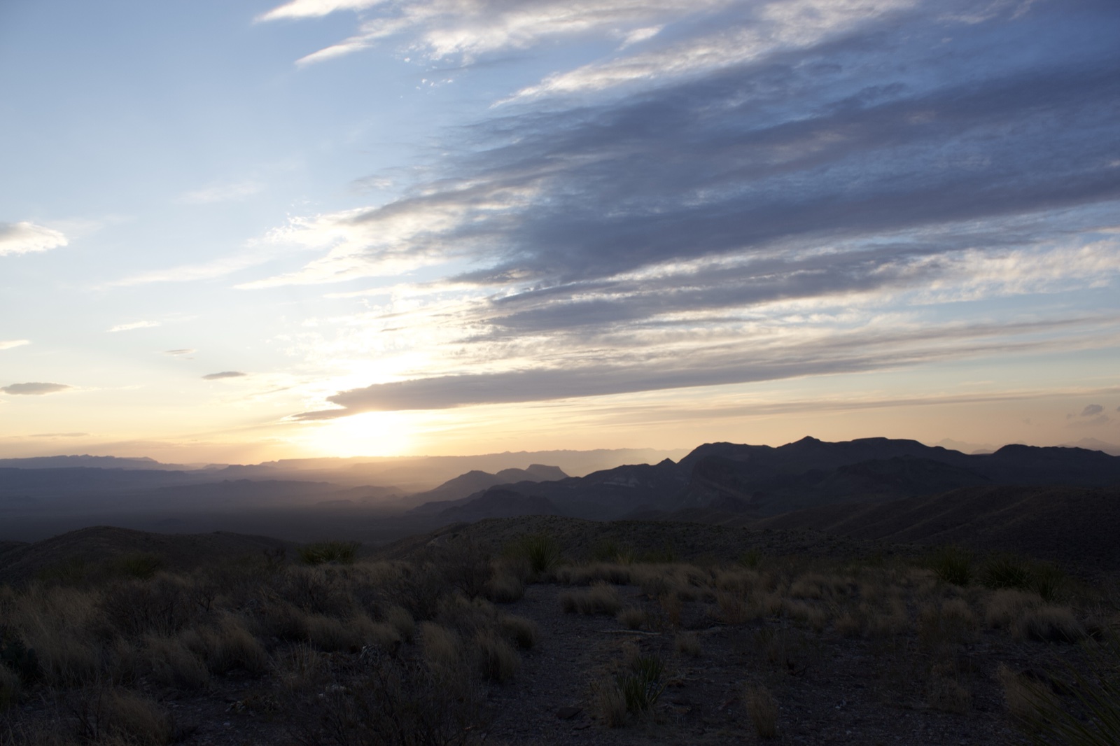 Desert Sunset Over Mountain Range