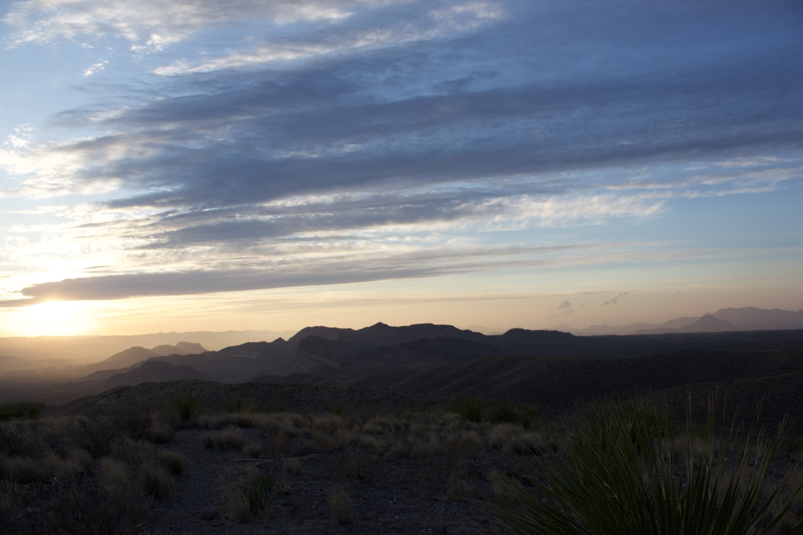 Desert Sunset Over Mountain Range