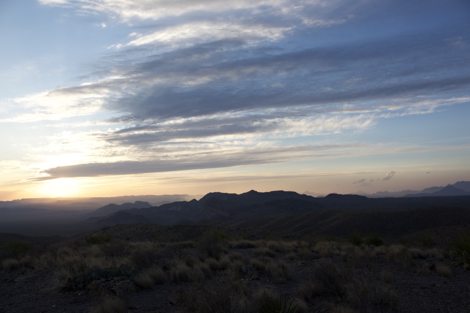 Desert Sunset Over Mountain Range